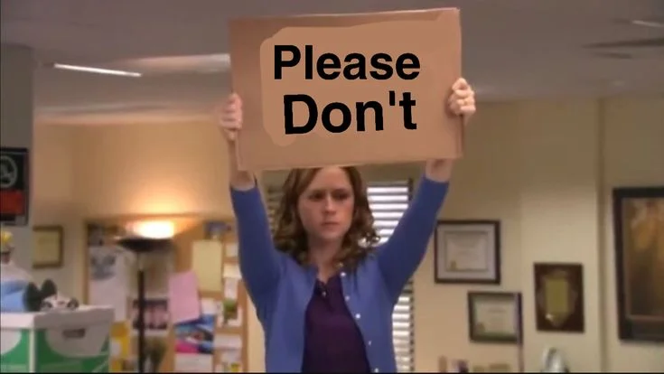 Pam from The Office holding up a cardboard sign that says Please Don't, the banner for a post about not using boolean columns in a database